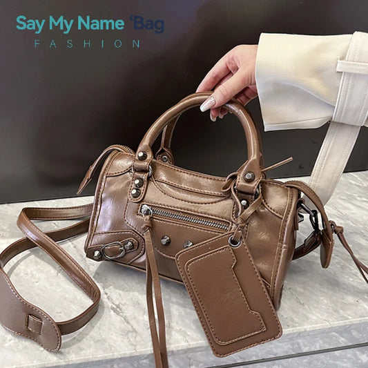Moto Rivet Mini Crossbody Bag – Retro PU Shoulder Bag with Butterfly Knot Detail