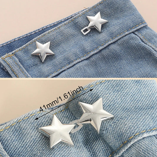 Pair of adjustable jean button clips on white background